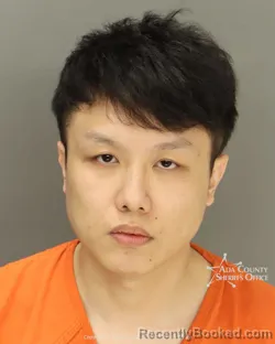 Mugshot of Jiaxing Guan booked in Ada County, Idaho on March 19, 2026