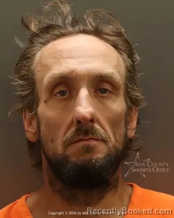 Mugshot of Mitchell Ryan Baker booked in Ada County, Idaho on March 20, 2026