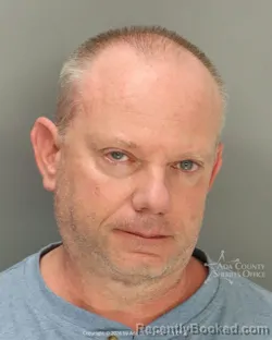 Mugshot of Bradley Christopher Enscoe booked in Ada County, Idaho on March 20, 2026