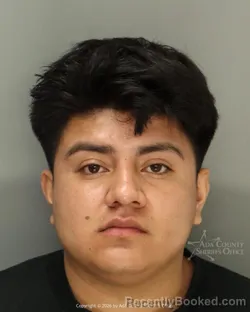 Mugshot of Juan David Aguilar booked in Ada County, Idaho on March 21, 2026