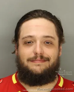Mugshot of Logan Peter Moore booked in Ada County, Idaho on April 24, 2026