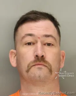 Mugshot of Nicholas Timothy Raymon booked in Ada County, Idaho on October 12, 2026