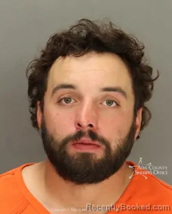 Mugshot of Garrett Ashten Porterfield booked in Ada County, Idaho on July 14, 2026