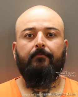 Mugshot of Jose Salvador Ricomedina booked in Ada County, Idaho on July 27, 2026