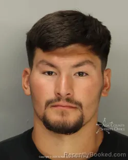 Mugshot of Enrique Andres Aguilar booked in Ada County, Idaho on August 23, 2026