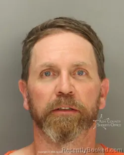 Mugshot of Michael James Evans booked in Ada County, Idaho on August 27, 2026