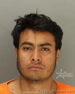 Mugshot of Erling Javier Flores Olivas booked in Ada County, Idaho on October 14, 2026