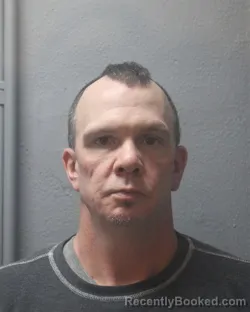 Mugshot of JUSTIN MICHAEL SWEATFIELD