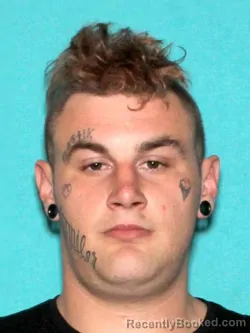 Mugshot of JUSTIN WAYNE ROLLINS booked in Bonner County, Idaho on March 27, 2026