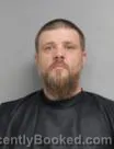 Mugshot of TRAVIS RANDALL HOWELL