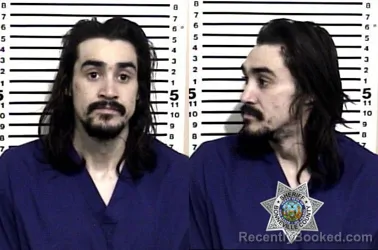 Mugshot of MANUEL ANTONIO SERVELLON