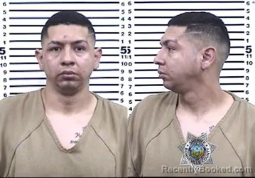 Mugshot of JONATHAN E MANCILLA CARAVEO