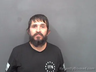 Mugshot of CAMERON E BARRUS