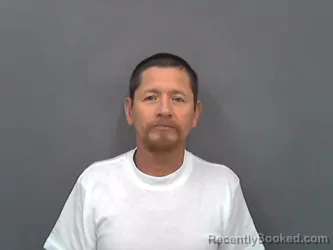 Mugshot of SANTOS CORONA-MERCADO