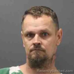 Mugshot of JASON THOMAS MOTZKUS