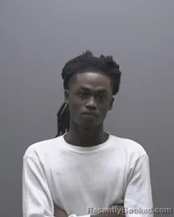 Mugshot of JYKWAN EDZAVOR DAYE booked in Alamance County, North Carolina on April 20, 2026