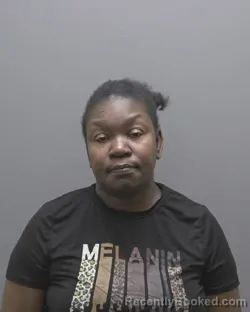 Mugshot of Kwana Mcghee Hines booked in Alamance County, North Carolina on October 4, 2026