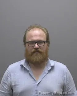Mugshot of Daniel Lee Olson booked in Alamance County, North Carolina on August 12, 2026