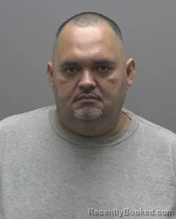 Mugshot of JARROD LOUIS AGUALO booked in Alamance County, North Carolina on July 13, 2026