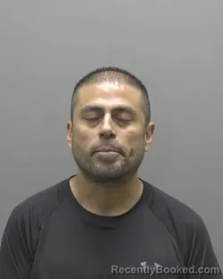 Mugshot of MIGUEL ANGEL MUNIZ booked in Alamance County, North Carolina on June 21, 2026