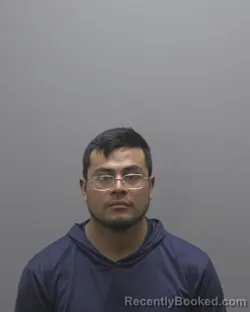 Mugshot of Junio Chembe Garcia-Carrillo booked in Alamance County, North Carolina on August 9, 2026