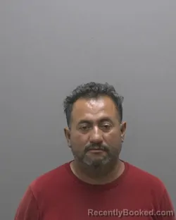 Mugshot of Victor Mendoza booked in Alamance County, North Carolina on August 21, 2026