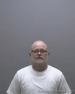 Mugshot of Michael Leo Dale Harrison booked in Alamance County, North Carolina on October 21, 2026