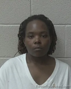 Mugshot of KYESHA RASHAE CARLTON booked in Alexander County, North Carolina on April 1, 2026