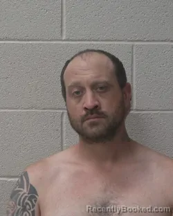 Mugshot of Brandon Edward Coulbourn booked in Alexander County, North Carolina on September 24, 2026