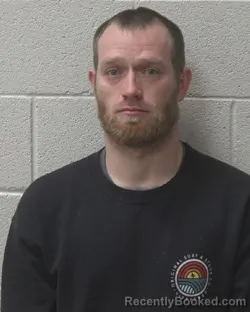 Mugshot of JOSHUA EUGENE CHRISMAN booked in Alexander County, North Carolina on May 17, 2026