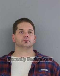 Mugshot of JASON HAIL KENZIE booked in Madera County, California on April 13, 2026