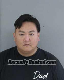 Mugshot of KER VANG booked in Madera County, California on April 30, 2026