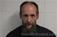 Mugshot of Christopher Dean Oakes booked in Avery County, North Carolina on October 4, 2026