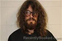 Mugshot of JOSHUA KYLE ROMANAT booked in Avery County, North Carolina on March 19, 2026