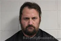 Mugshot of Travis Ray Hollis booked in Avery County, North Carolina on October 21, 2026
