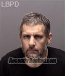 Booking photo from Merced County, California