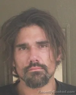 Mugshot of TILLMAN J HEDRICK