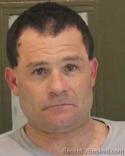 Mugshot of MANUEL M CALARRUDA