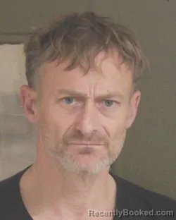 Mugshot of CARL F HAWTHORNE