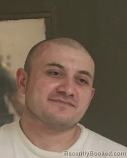 Mugshot of Stanley Madrigal