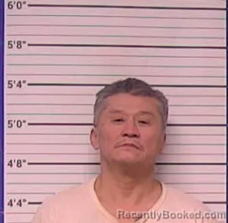 Mugshot of HUNG JOSEPH HOANG booked in Bladen County, North Carolina on March 27, 2026