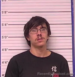 Mugshot of Justin Hubert Hall booked in Bladen County, North Carolina on August 9, 2026