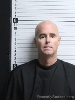 Mugshot of JUSTIN TEDROW NEWMAN booked in Brunswick County, North Carolina on April 27, 2026