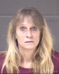 Mugshot of Angela Powell Carpenter booked in Buncombe County, North Carolina on August 21, 2026