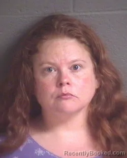 Mugshot of APRIL SHEERE CARVER booked in Buncombe County, North Carolina on July 1, 2026