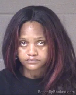 Mugshot of ASIA MONIQUE JORDAN booked in Buncombe County, North Carolina on May 16, 2026