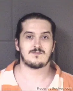 Mugshot of Alan Charles Marcellin booked in Buncombe County, North Carolina on August 21, 2026