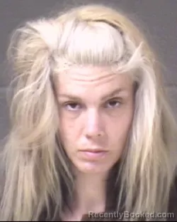 Mugshot of APRIL COLEEN MOORE booked in Buncombe County, North Carolina on March 18, 2026