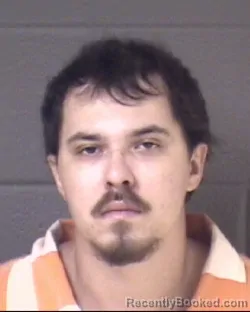 Mugshot of Atticus Sebastian Manfredi booked in Buncombe County, North Carolina on August 18, 2026