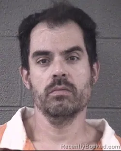 Mugshot of ANTHONY NIKOLAS TZIOTIS booked in Buncombe County, North Carolina on August 3, 2026